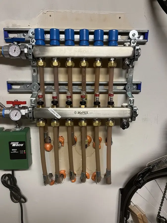 Plumber performing Water Heater Repair at a residential property in Mineral Wells